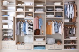 Stylish,Clothes,,Shoes,And,Home,Stuff,In,Large,Wardrobe,Closet